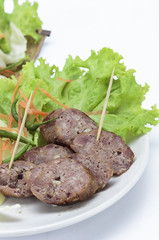 Sour pork and vegetable snacks in Thailand on white background
