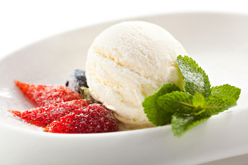 Ice Cream Garnished with Strawberry and Mint