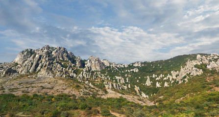 Obraz premium Panorama of the mountain South Demerdzhi on a background of clouds. Crimea.