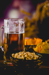 Beer, snack, party concept, wooden table
