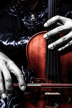 violinist hands posing on classical violin, art filter for music background