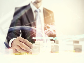 He is building his business . Mixed media