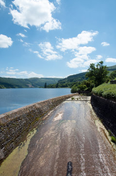 Sluce channel on Talybont lake in the mountains of Wales.