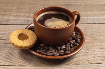Cup of coffee with biscuit