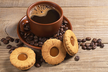 Cup of coffee with biscuit