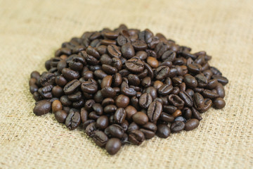 coffee seeds on jute bag background