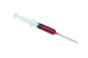 syringe with drop red blood liquid isolated on white background.