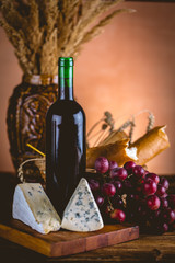 Bottle of wine with cheese, Mediterranean concept