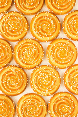 Round cookies with sesame seeds. Top view