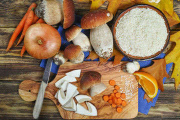 Ingredients for risotto with wild mushrooms boletus