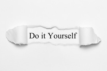Do it Yourself on white torn paper