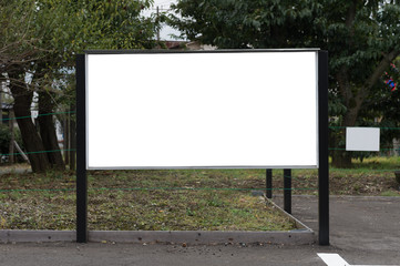 Large blank billboard on a street wall, banners with room to add your own text