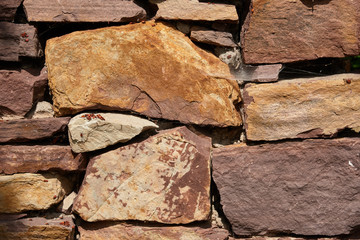 A fragment of a wall of sandstone