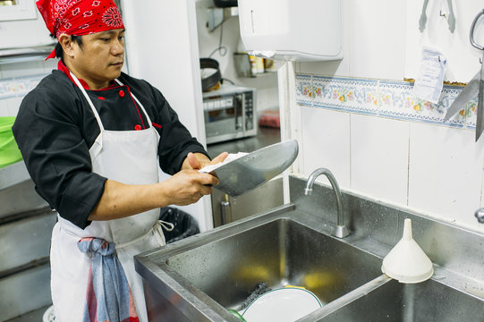 Hispanic cook in diner kitchen