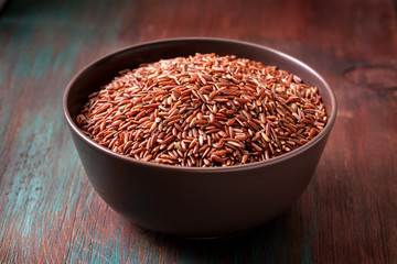 red rice in a ceramic bowl