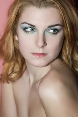 Fototapeta premium Portrait of beautiful female model with make up