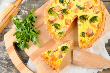delicious pie with salmon and broccoli