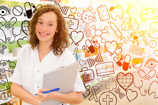 Attractive pharmacist taking notes at work surrounded by icons