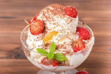 delicious dessert pink ice cream scoops with fresh strawberry, s