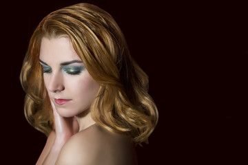 Fototapeta premium Portrait of beautiful female model with make up