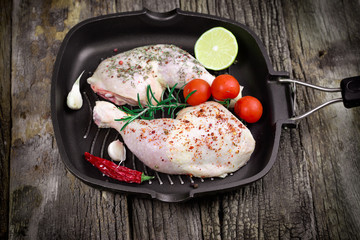 Fresh raw chicken drumstick - raw chicken leg in pan