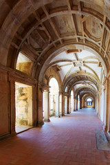 Fototapeta na wymiar Long portico in the Convent of Christ (Convento de Cristo) in Tomar, Portugal
