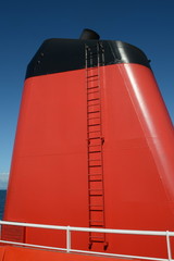 A red and black ferry funnel
