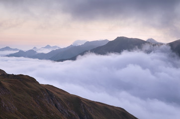 mountain range in morning fog