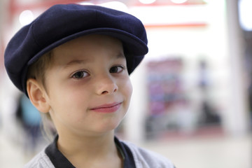 Child in large cap