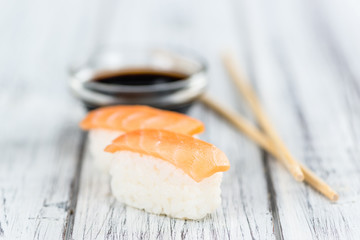 Sushi on a wooden table (selective focus)