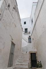 Facade of a building located in Ostuni, also known as "the white city", in the south of Italy.
