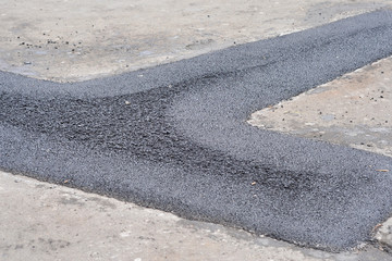 Repair pavement and laying new asphalt patching method outdoors.