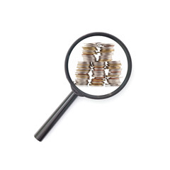 Magnifying glass with Stack of coins money
