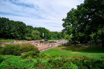 Bethesda Fountain and square filled with people in Central Park on Manhattan