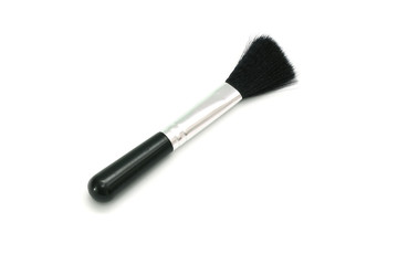 Isolated black cleaning brush closeup on white background