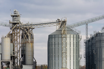 Metal grain elevator in agricultural zone.