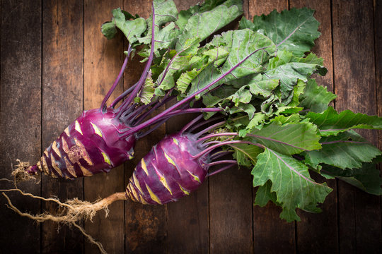 Fresh organic kohlrabi on the wooden table