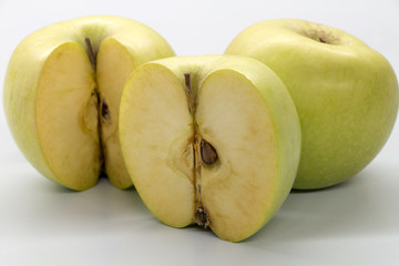 green apple on white table