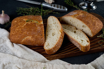 The Italian bread ciabatta with garlic and herbs

