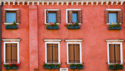 Fototapeta na wymiar Beautiful colorful house facade in Venice, Italy.