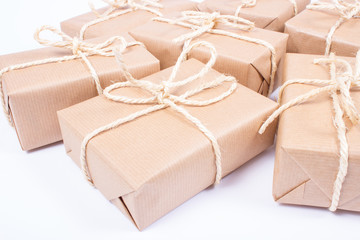 Rustic parcels gift box with kraft paper.