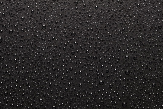 Black background with water drops