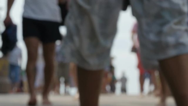 Crowds of tourists in the resort town. Palanga, Lithuania, the image blurred, no recognizable people.