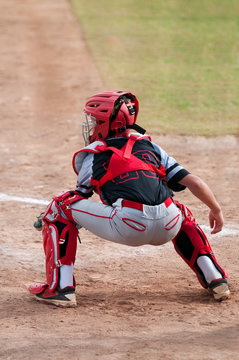 American teen baseball player catching