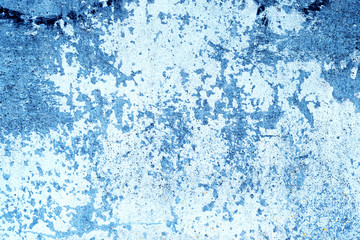 Wall fragment with scratches and cracks