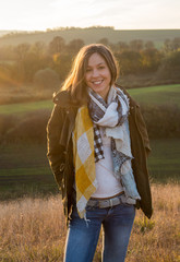 Norwegian style - outdoor woman in field in fall