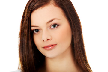 Fototapeta premium Smiling beautiful brunette young woman