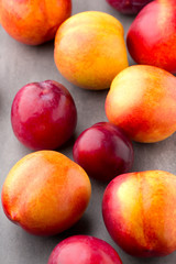 Fresh fruit on the gray background.