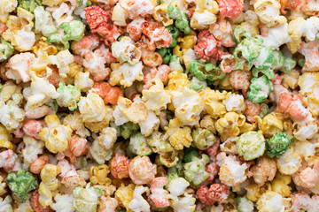 Colored Popcorn texture background. Sweet popcorn.