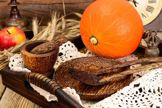 Thanksgiving table setting  with autumn pumpkins , cutlery and n